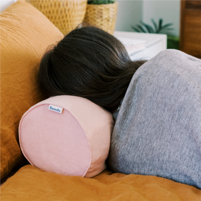 women sleeping with bearaby napper
