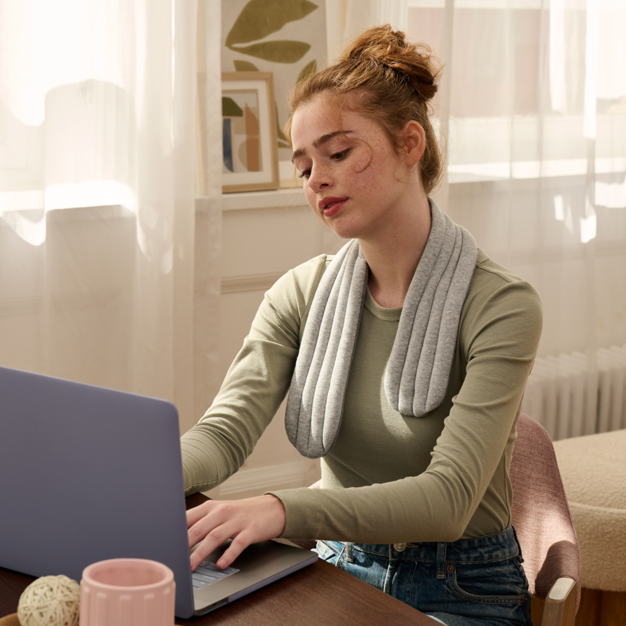 lady working with heated neck wrap