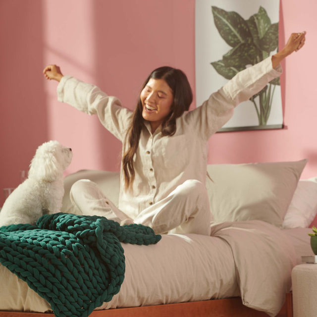 Should I Let My Dog Sleep in Bed with Me?