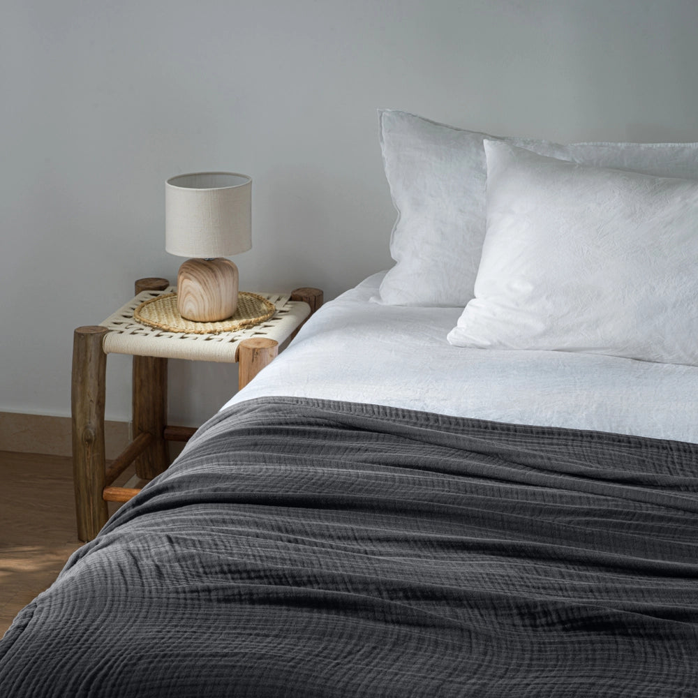muslin blanket for adults on bed