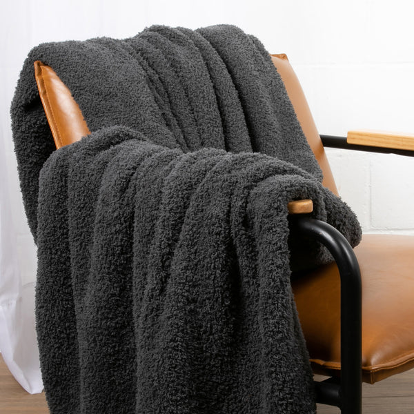 bearaby plush blanket on chair