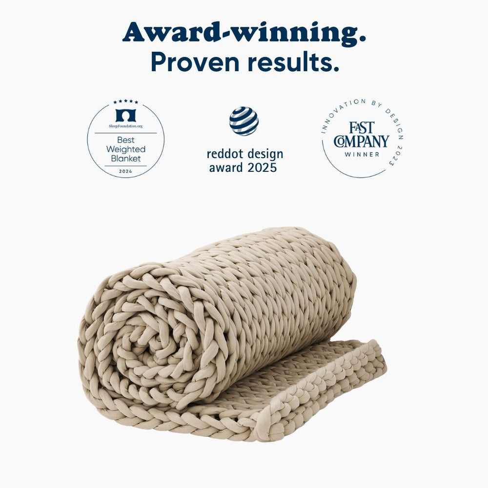 Rolled  blanket with award badges on a white background