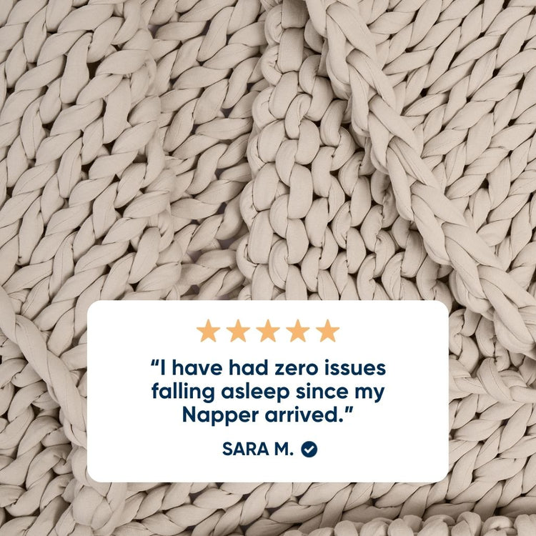 Driftwood colored bearaby ocean blanket with a five-star rating card and customer review.