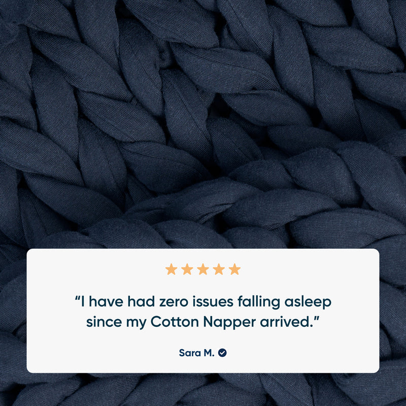 midnight blue cotton knitted blanket with a five-star rating text overlay