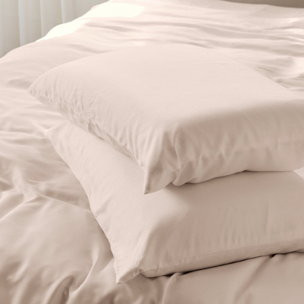 bearaby morning pearl bamboo pillowcase on bed