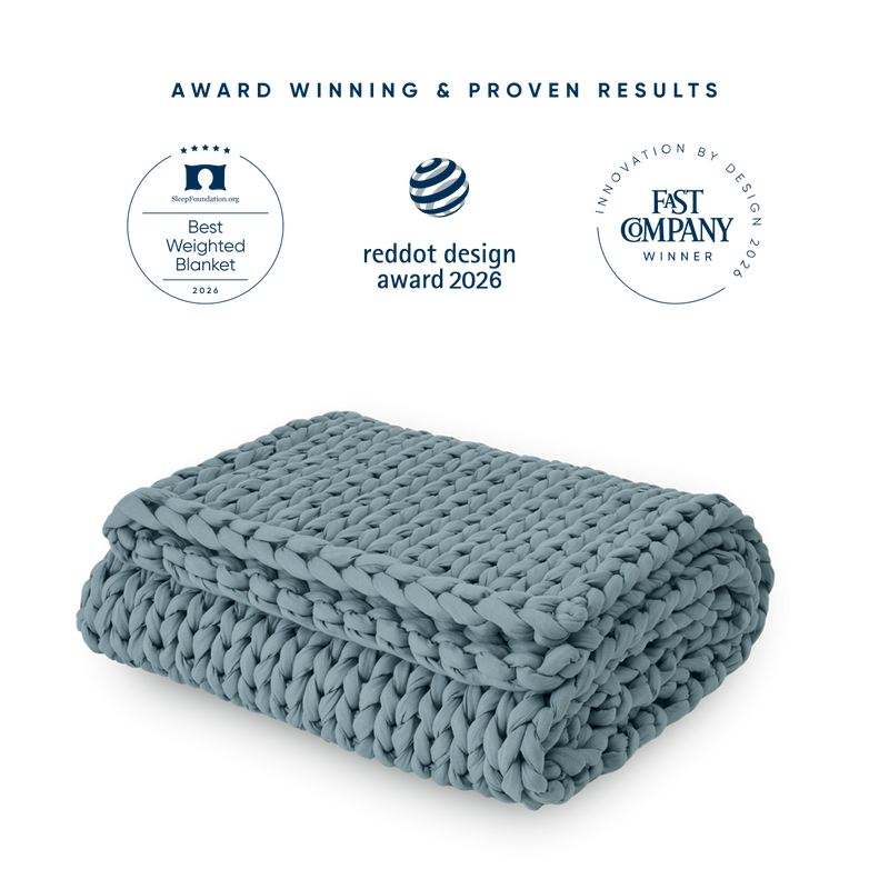 Blue spruce weighted blanket with three award badges